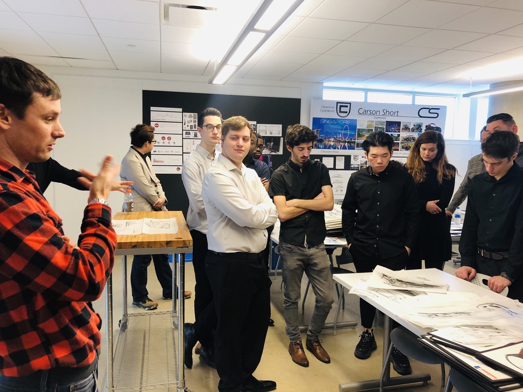 Scott leading a transportation design critique with students